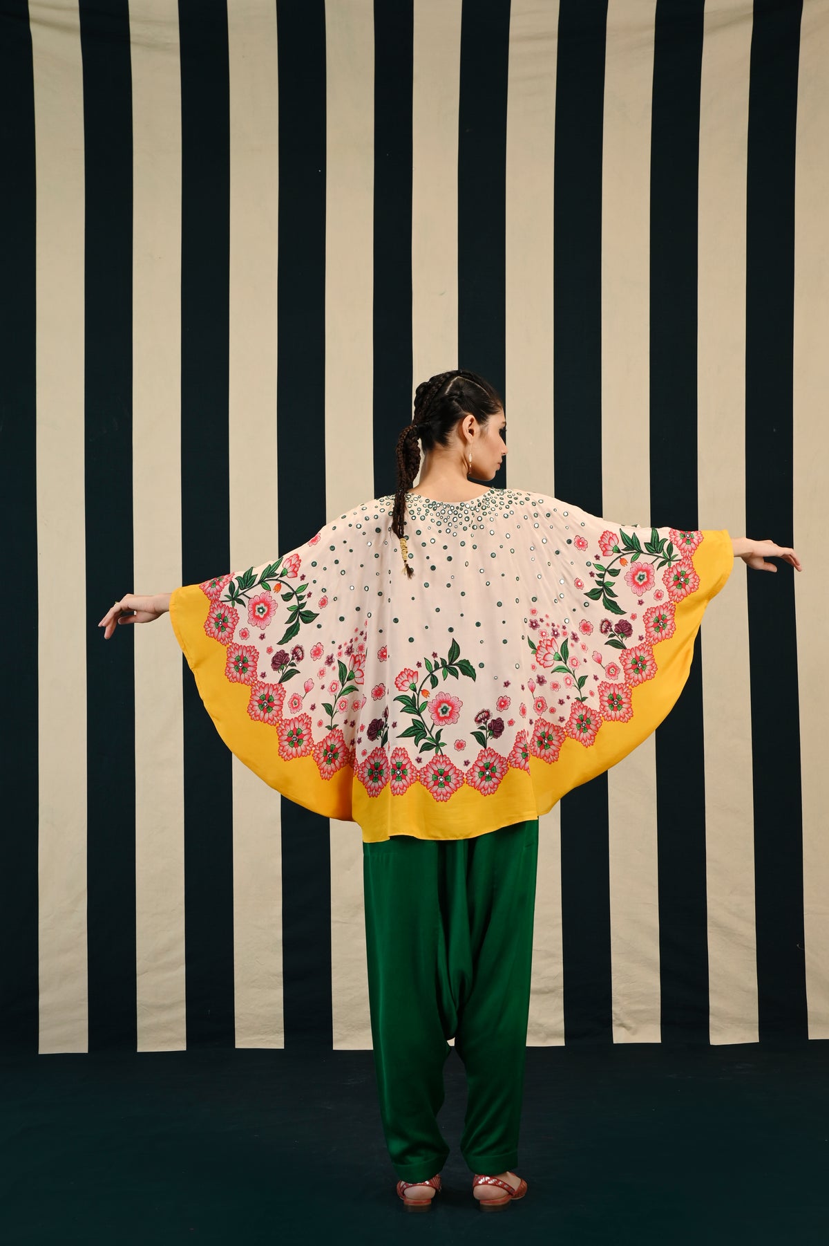 gulmohar moksha cape set,
round cape set for women,
designer cape set,
ethnic cape set,
boho cape outfit,
silk cape set,
handcrafted cape set,
festive cape set,
traditional cape dress,
cape tunic set,
cape and dhoti set,
cape and skirt set,
cape set for girls,
lightweight cape set,
embroidered cape set,
contemporary cape set,
plus size cape set,
cape set for summer,
resort wear cape set,
cape set for weddings,