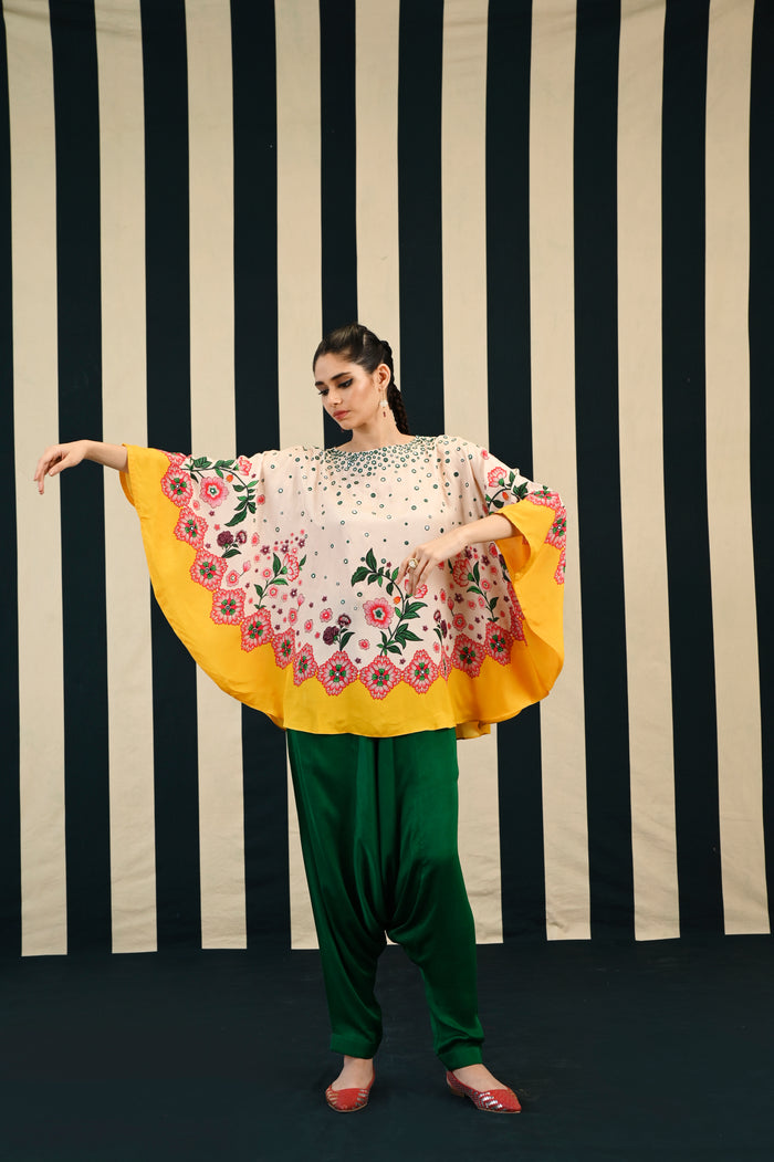 gulmohar moksha cape set,
round cape set for women,
designer cape set,
ethnic cape set,
boho cape outfit,
silk cape set,
handcrafted cape set,
festive cape set,
traditional cape dress,
cape tunic set,
cape and dhoti set,
cape and skirt set,
cape set for girls,
lightweight cape set,
embroidered cape set,
contemporary cape set,
plus size cape set,
cape set for summer,
resort wear cape set,
cape set for weddings,