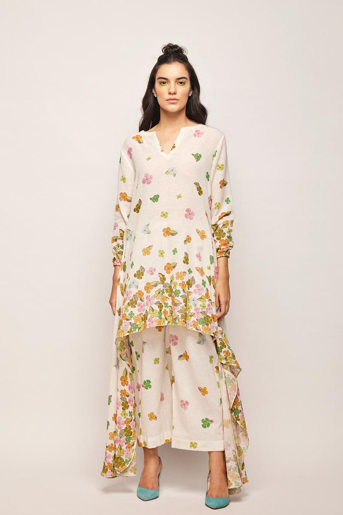 fleur high-low hem tunic co-ord set,
swati vijaivargie co-ord set,
floral print co-ord set,
high-low hem tunic,
hand-embroidered pleated pants,
jaipur heritage pleated pants,
luxury silk pleated pants for girls,
chameli print pleated pants set,
traditional indian pleated pants,
ethnic silk pleated pants for women,
designer pleated pants set for girls,
bember modal satin pleated pants,
handcrafted silk pleated pants,
jaipur ethnic wear pleated pants,
luxury pleated pants set online,
customizab