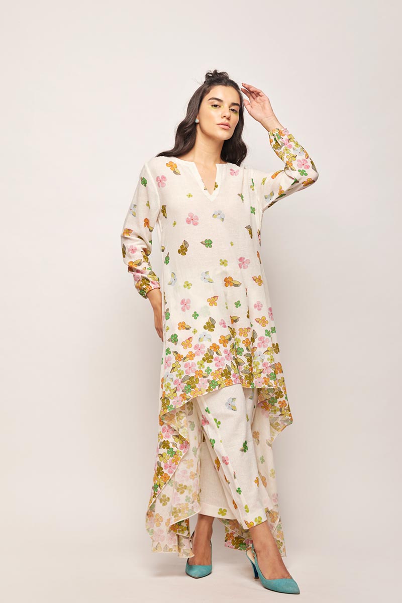 fleur high-low hem tunic co-ord set,
swati vijaivargie co-ord set,
floral print co-ord set,
high-low hem tunic,
hand-embroidered pleated pants,
jaipur heritage pleated pants,
luxury silk pleated pants for girls,
chameli print pleated pants set,
traditional indian pleated pants,
ethnic silk pleated pants for women,
designer pleated pants set for girls,
bember modal satin pleated pants,
handcrafted silk pleated pants,
jaipur ethnic wear pleated pants,
luxury pleated pants set online,
customizab