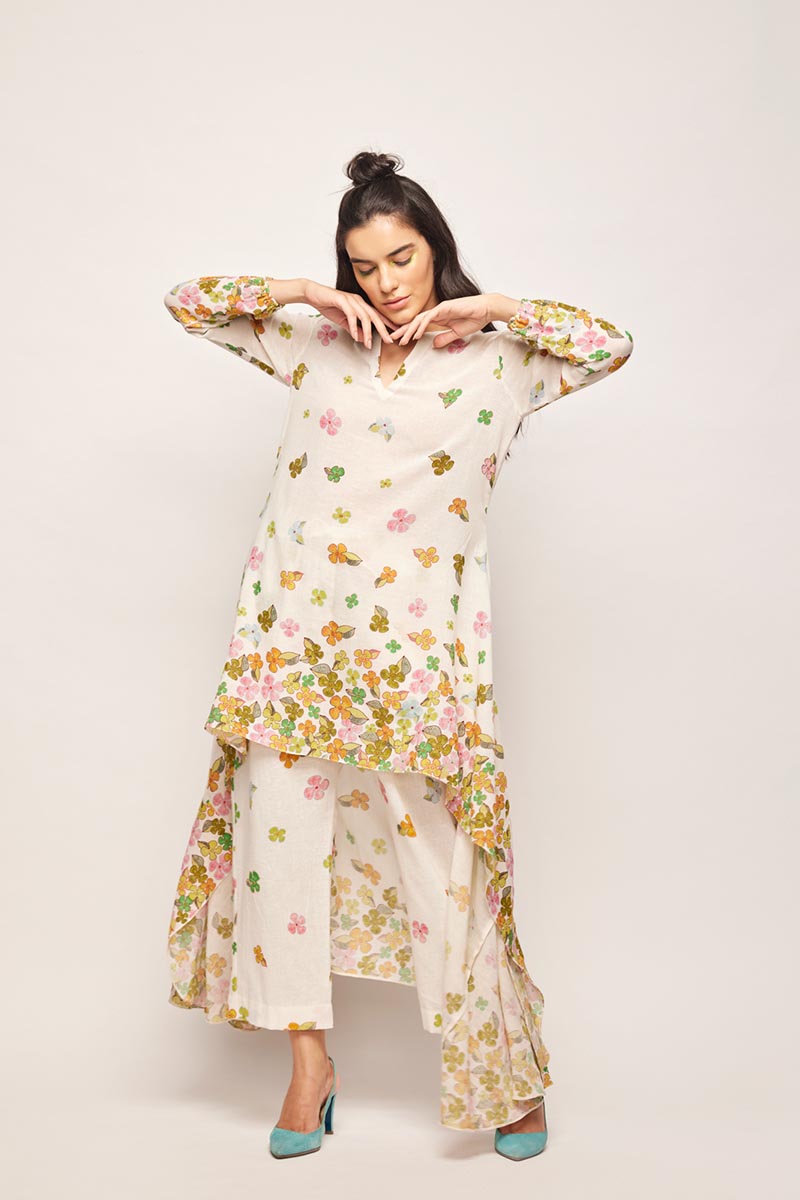 fleur high-low hem tunic co-ord set,
swati vijaivargie co-ord set,
floral print co-ord set,
high-low hem tunic,
hand-embroidered pleated pants,
jaipur heritage pleated pants,
luxury silk pleated pants for girls,
chameli print pleated pants set,
traditional indian pleated pants,
ethnic silk pleated pants for women,
designer pleated pants set for girls,
bember modal satin pleated pants,
handcrafted silk pleated pants,
jaipur ethnic wear pleated pants,
luxury pleated pants set online,
customizab