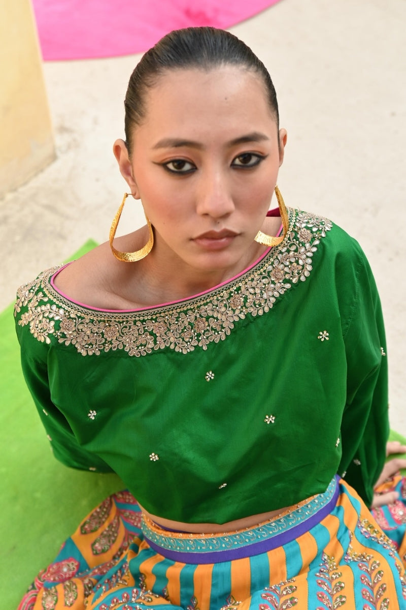 peacock lehenga with green blouse for women,
luxury peacock lehenga with emerald green top,
peacock lehenga with emerald green choli for wedding,
peacock lehenga for special occasions with green top,
designer peacock lehenga with emerald green blouse,
traditional peacock lehenga with emerald green top,
emerald green lehenga with peacock embroidery for weddings,
bridal lehenga with green top,
luxury bridal lehenga with peacock design,
emerald green bridal lehenga,
