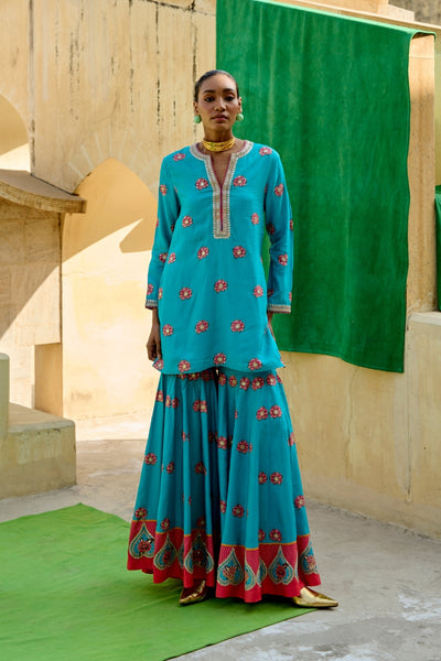 luxury turquoise sharara set for weddings,
jantar mantar sharara set for special occasions,
designer turquoise sharara set for women,
turquoise sharara set for bridal wear,
traditional turquoise sharara set for women,
sharara set for festive occasions in turquoise,
jantar mantar turquoise sharara set for brides,
sharara choli set for women,
bridal sharara set for women,
ethnic wear sharara set,
turquoise ethnic wear for women,
indian sharara set for women,
wedding sharara set for brides,