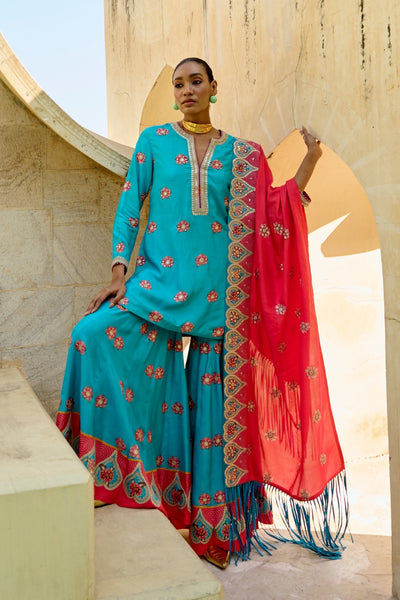 luxury turquoise sharara set for weddings,
jantar mantar sharara set for special occasions,
designer turquoise sharara set for women,
turquoise sharara set for bridal wear,
traditional turquoise sharara set for women,
sharara set for festive occasions in turquoise,
jantar mantar turquoise sharara set for brides,
sharara choli set for women,
bridal sharara set for women,
ethnic wear sharara set,
turquoise ethnic wear for women,
indian sharara set for women,
wedding sharara set for brides,