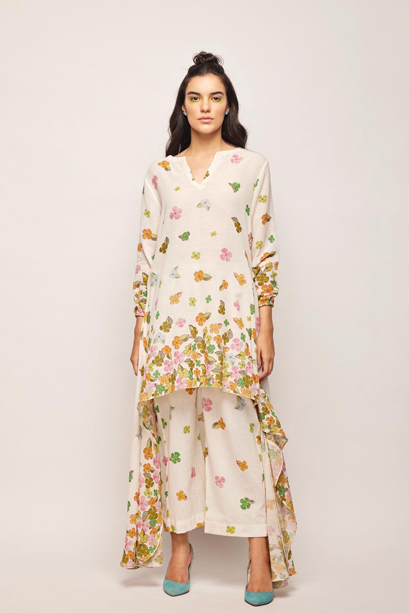 fleur high-low hem tunic co-ord set,
swati vijaivargie co-ord set,
floral print co-ord set,
high-low hem tunic,
hand-embroidered pleated pants,
jaipur heritage pleated pants,
luxury silk pleated pants for girls,
chameli print pleated pants set,
traditional indian pleated pants,
ethnic silk pleated pants for women,
designer pleated pants set for girls,
bember modal satin pleated pants,
handcrafted silk pleated pants,
jaipur ethnic wear pleated pants,
luxury pleated pants set online,
customizab
