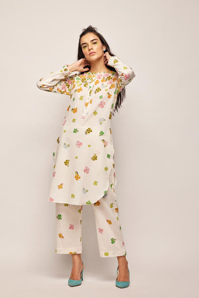fleur round hem tunic co-ord set,
floral embroidered co-ord set for women,
pastel beige co-ord set,
linen co-ord set with floral embroidery,
summer co-ord set for women,
co-ord set with round hem tunic,
elegant co-ord set for girls,
lightweight tunic co-ord set,
embroidered tunic and trouser set,
co-ord set with pearl and sequin details,
custom size co-ord set,
designer co-ord set for women,
handmade floral co-ord set,
off-white linen co-ord set,
floral jacquard co-ord set,
co-ord set with re